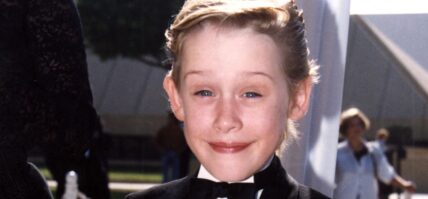 Macaulay Culkin in a tux when he was young