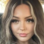 Haley Nicole takes selfie in car