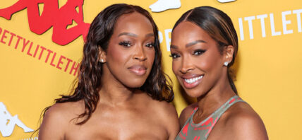 Malika/Khadijah Haqq posing on the red carpet.