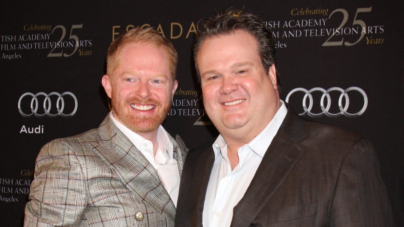 Eric Stonestreet & Jesse Tyler Ferguson Recall They ‘Took The Heat’ On ‘Modern Family’ As A Gay Couple