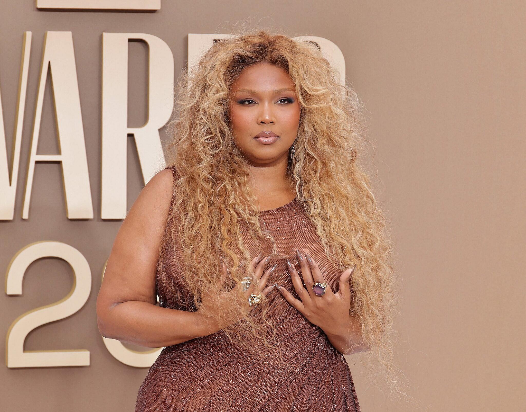 Lizzo Stuns Fans With Weight Loss In A Sheer Gown At The BETs