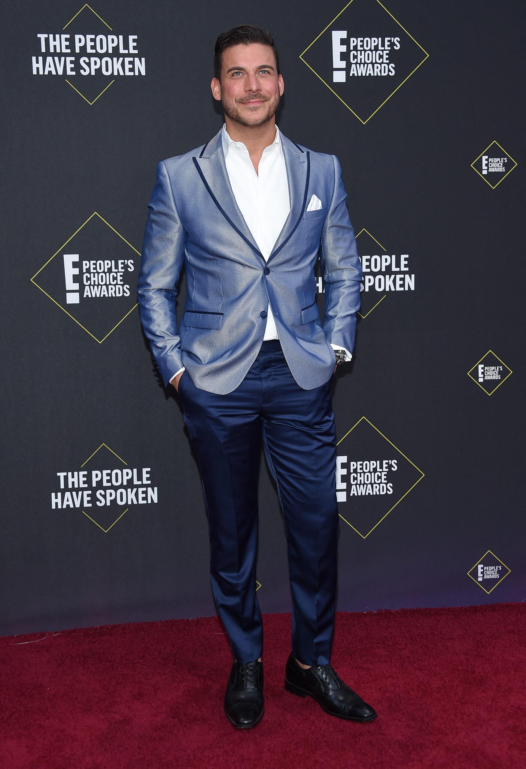 Jax Taylor posando no tapete vermelho em 2019.