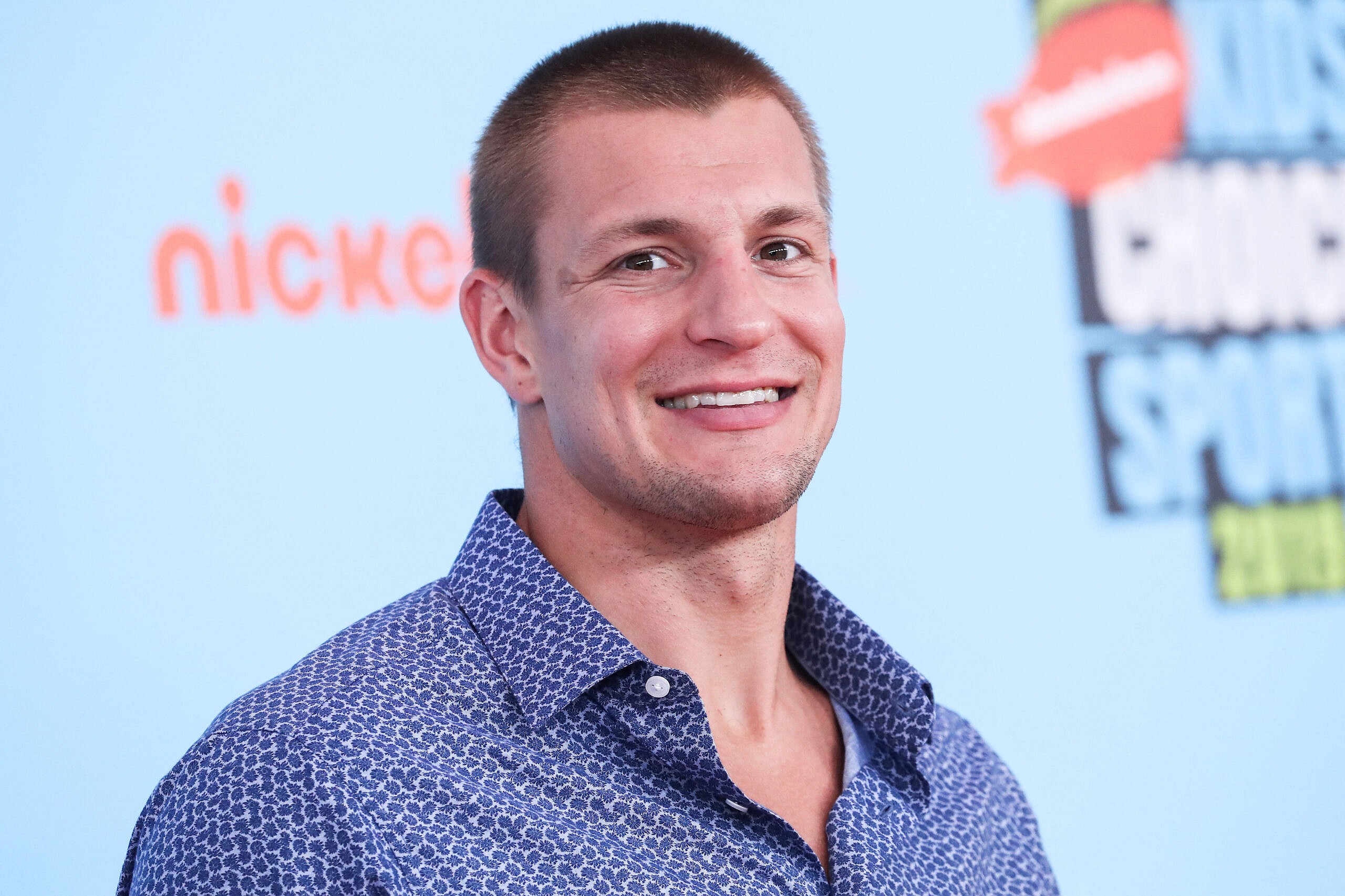 Rob Gronkowski posing on the red carpet.