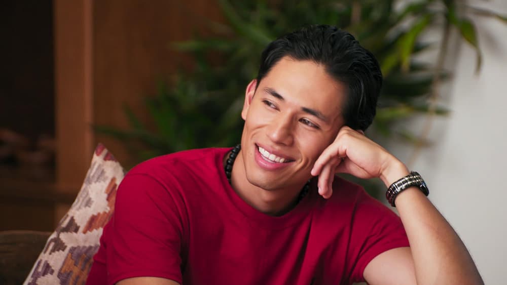 Edgar smiling at Marissa