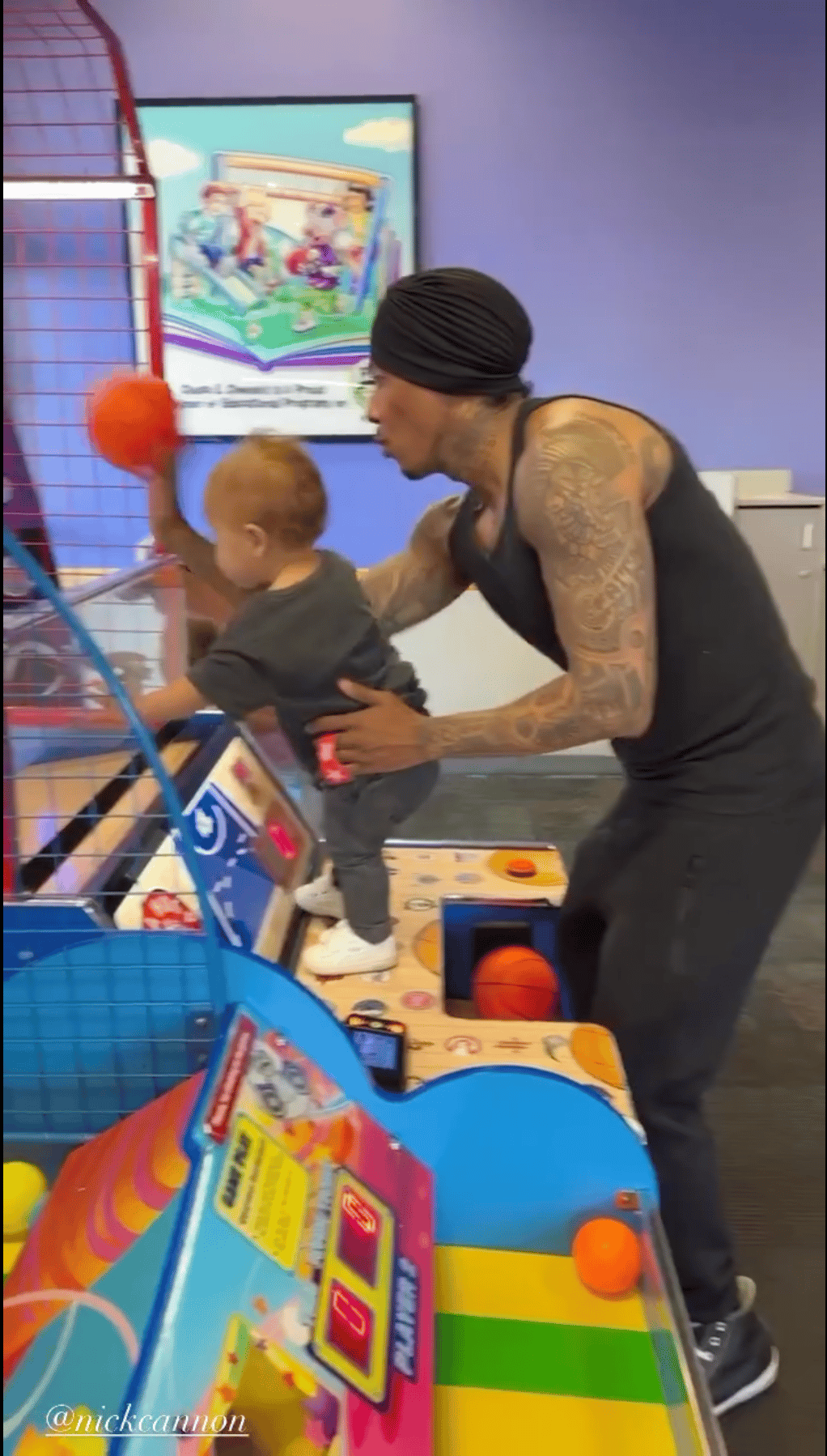 Nick Cannon and son bond at Chuck E. Cheese