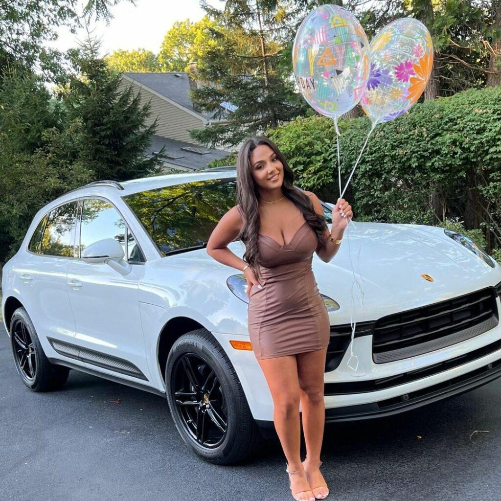 Antonia Gorga holding balloons.