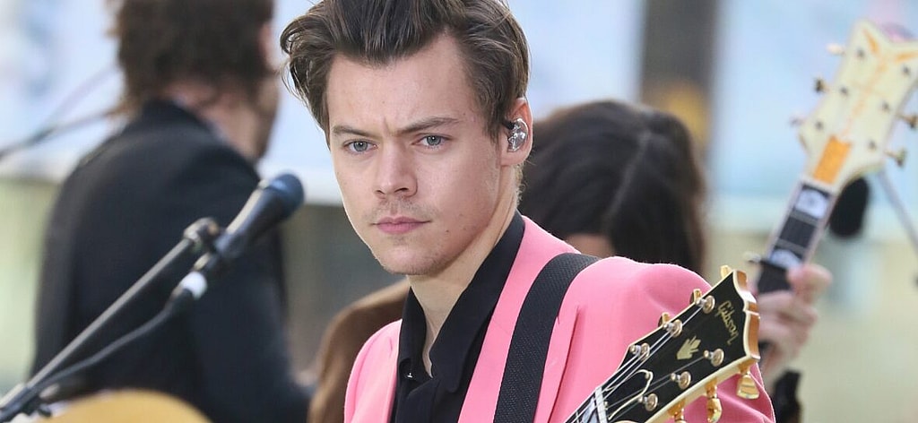 Harry Styles performs on the "Today Show" in New York City wearing pink suit.