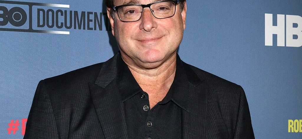 Bob Saget smiling.