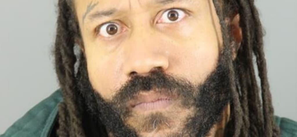 New wild-eyed booking photo of Waukesha Christmas parade suspect Darrell Brooks after his arrest over the tragedy