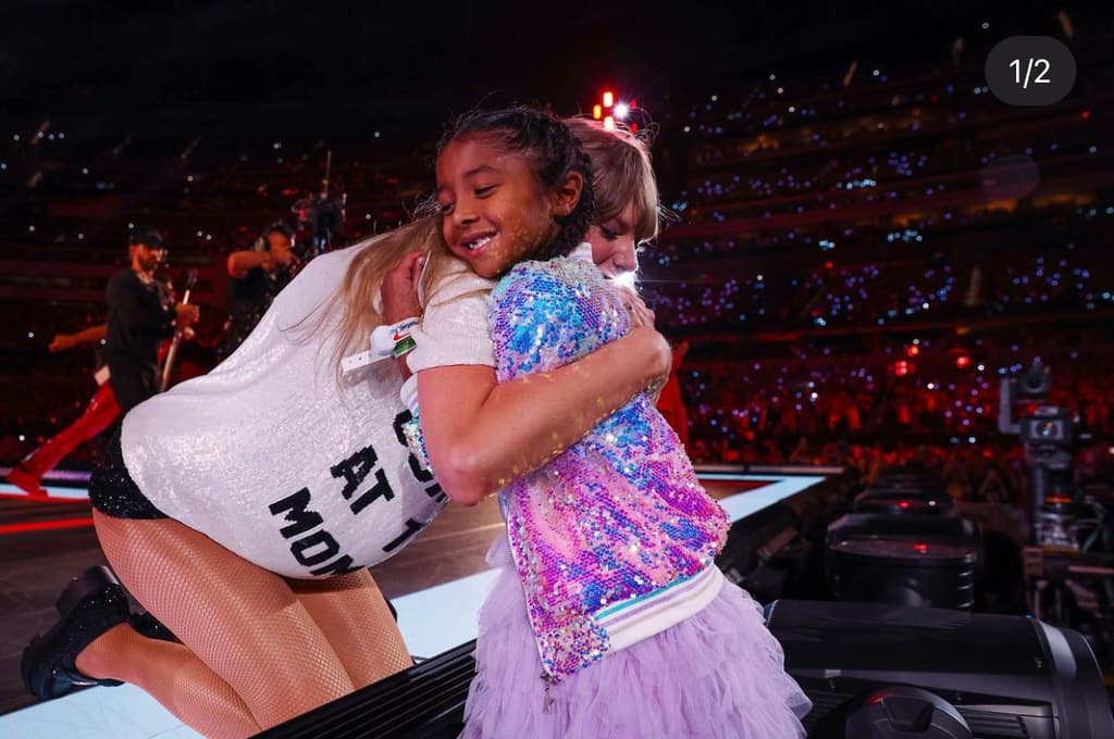 Taylor Swift hugging Bianka Bryant at the Eras Tour show