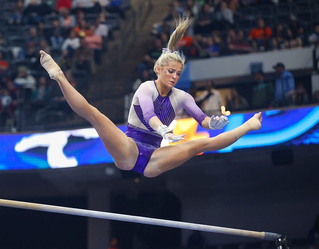 March 19, 2022: LSU's Olivia Dunne on the uneven parallel bars during the 2022 SEC Women's Gymnastics Championships at Legacy Arena in Birmingham, AL. Kyle Okita/CSM(Credit Image: © Kyle Okita/Cal Sport Media) Newscom/(Mega Agency TagID: csmphototwo885845.jpg) [Photo via Mega Agency]