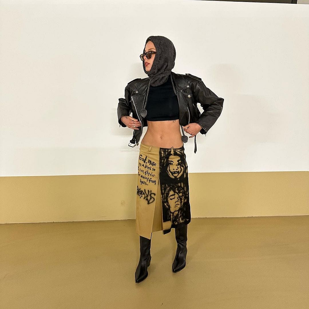 Halsey flaunts abs at Paris Fashion Week