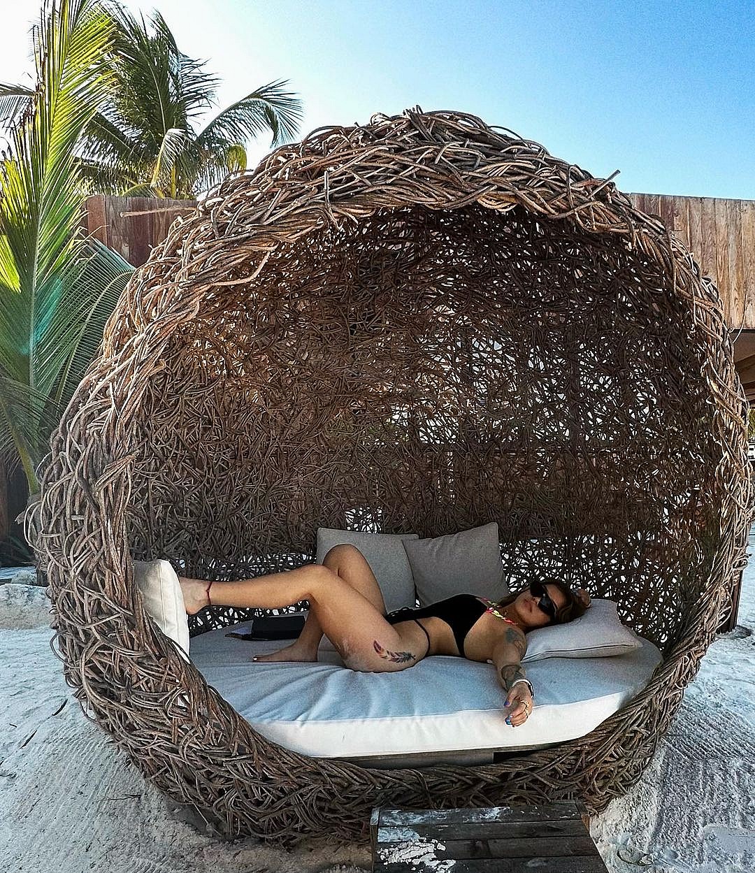 UFC fighter Tracy Cotez wears black bathing suit