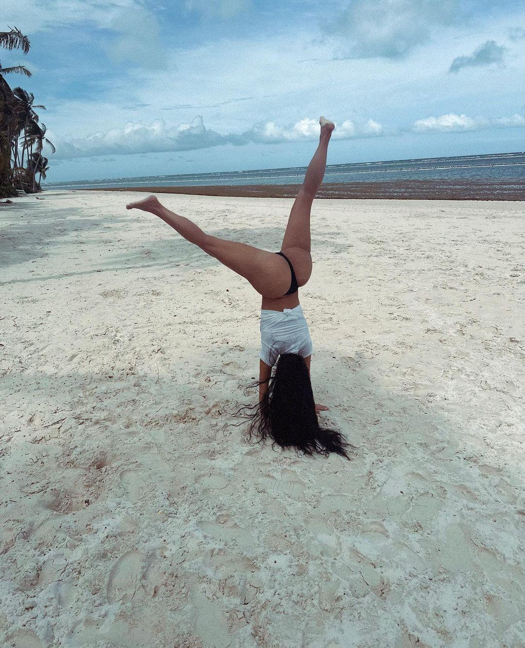 Billionaire Kim Kardashian Does A Cartwheel In A Thong On The Beach
