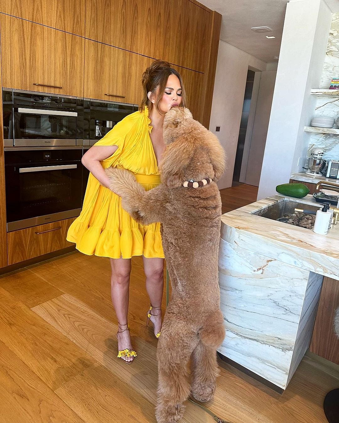 Chrissy Teigen enjoys day date with dog Petey