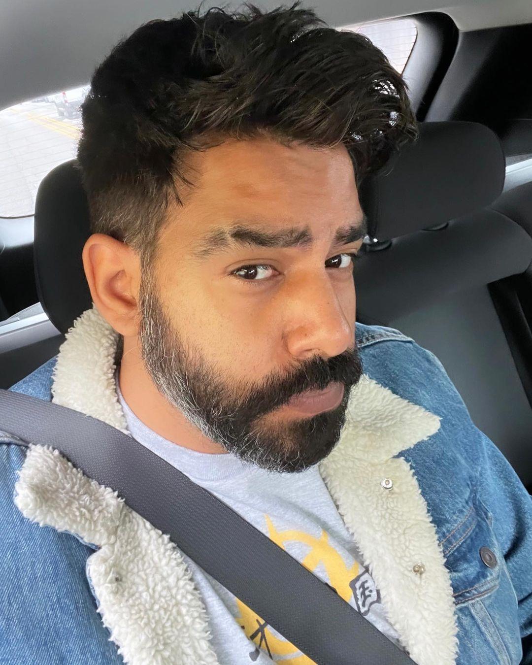 A selfie photo showing Rahul Kohli in a vehicle looking dashing.