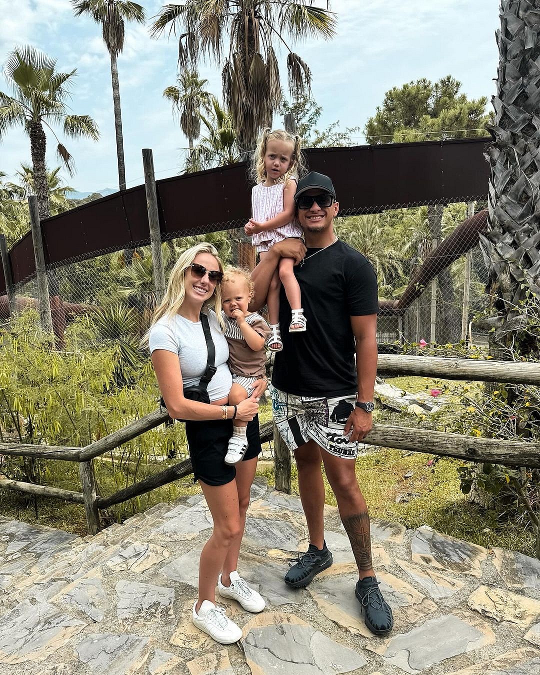 Brittany Mahomes and Patrick Mahomes with their two children