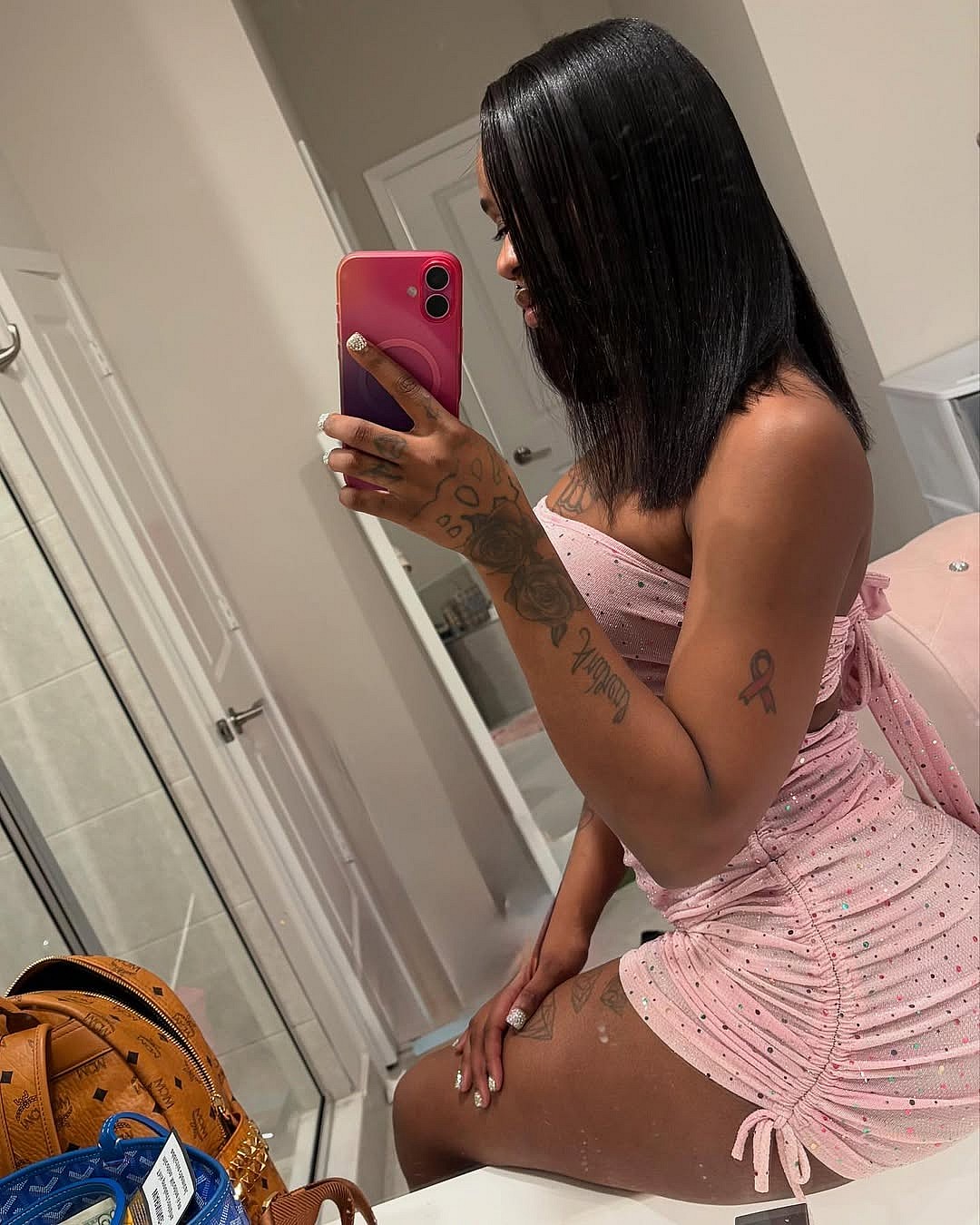 Sexyy Red takes mirror selfie