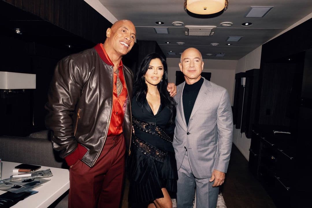Dwayne Johnson and Jeff Bezos and Lauren Sanchez