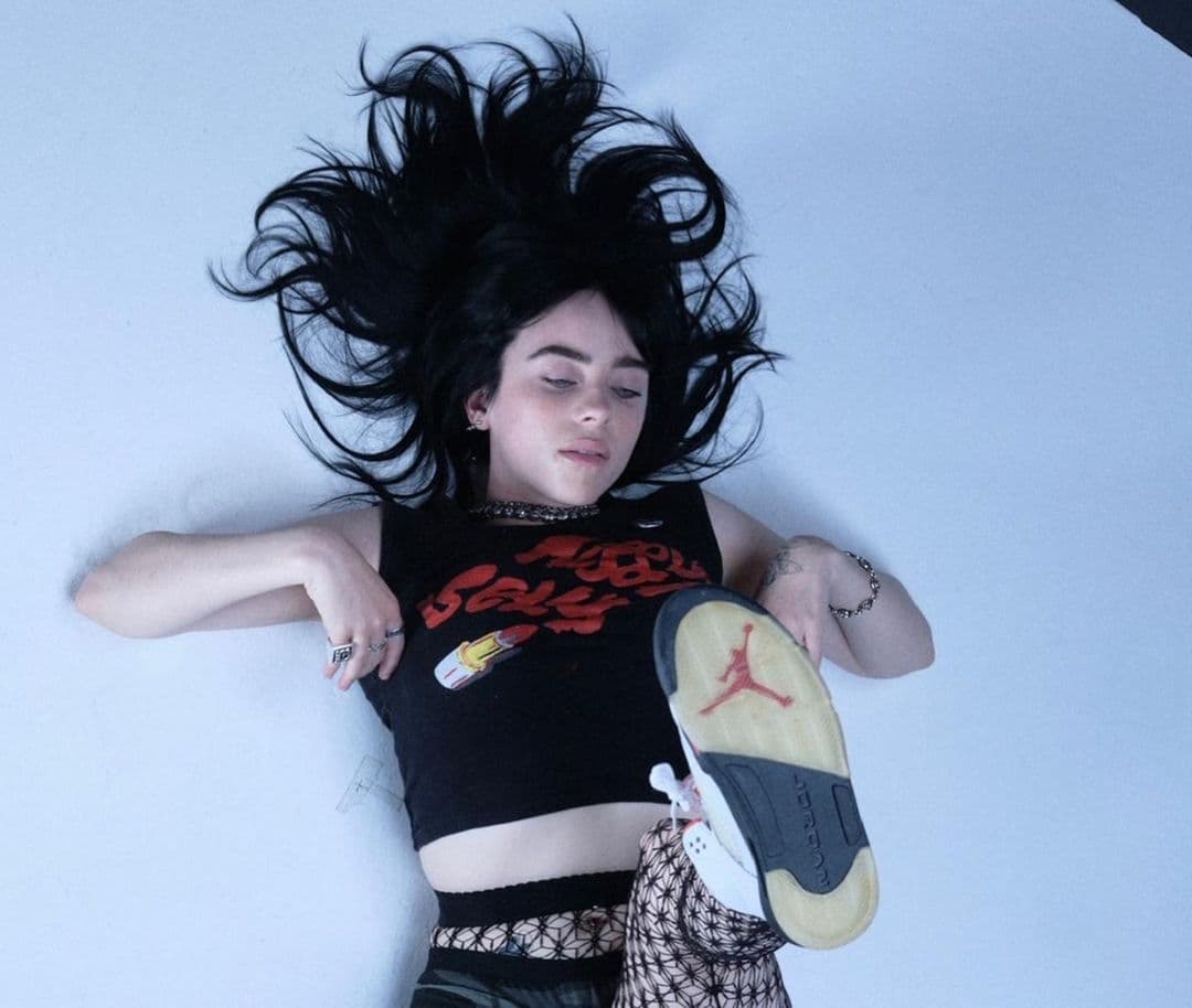Billie Eilish Flaunts Her Physique In A Crop Top & Fishnet Tights In Daring Photo Shoot