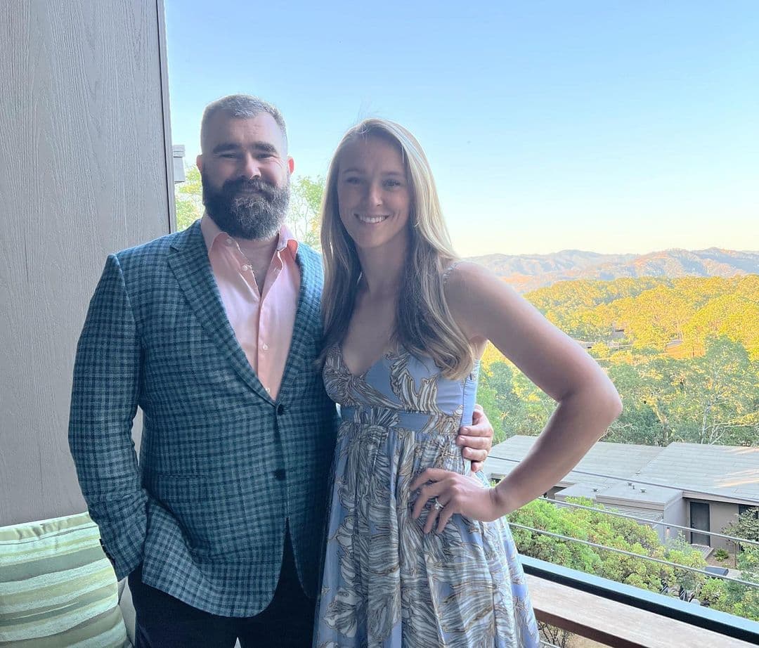 Jason Kelce and Kylie Kelce posing in formal attire