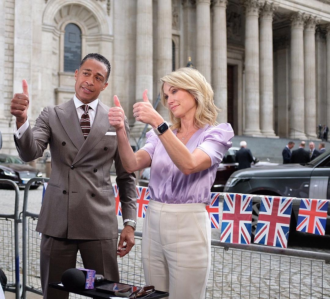 Amy Robach and T.J. Holmes giving the thumbs up
