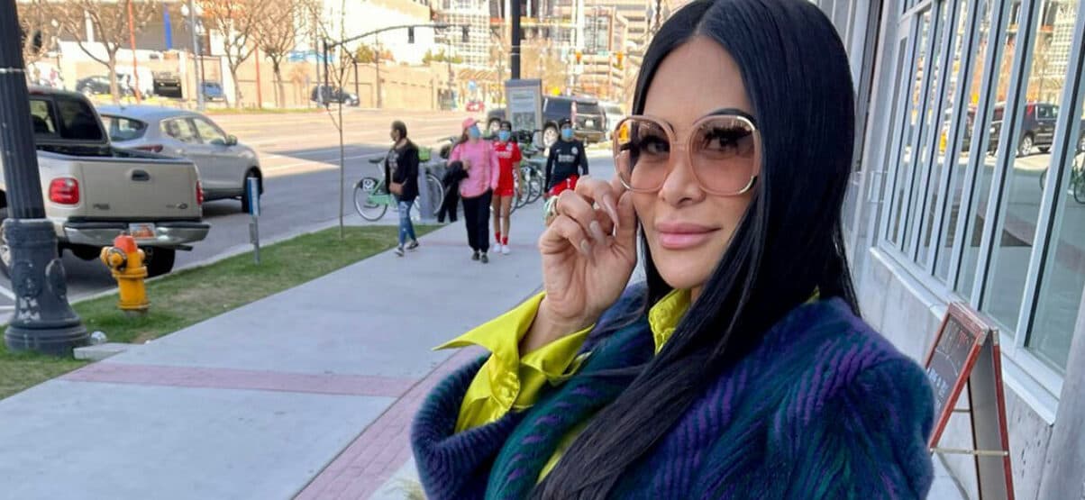 Jen Shah posing on sidewalk