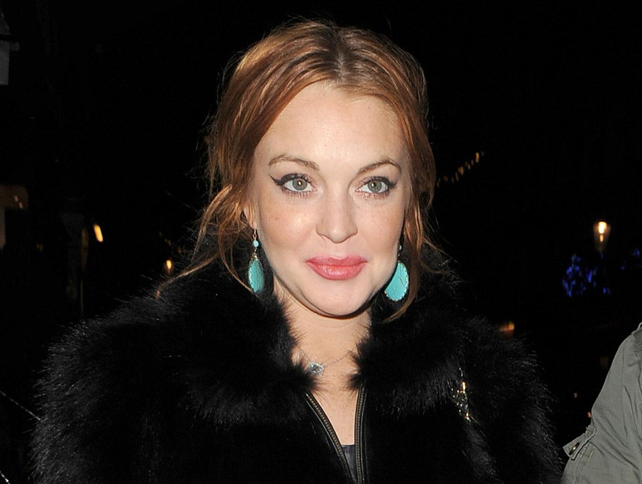Lindsay Lohan arrives at Nozomi restaurant with her minder and some friends The group stayed for around two hours