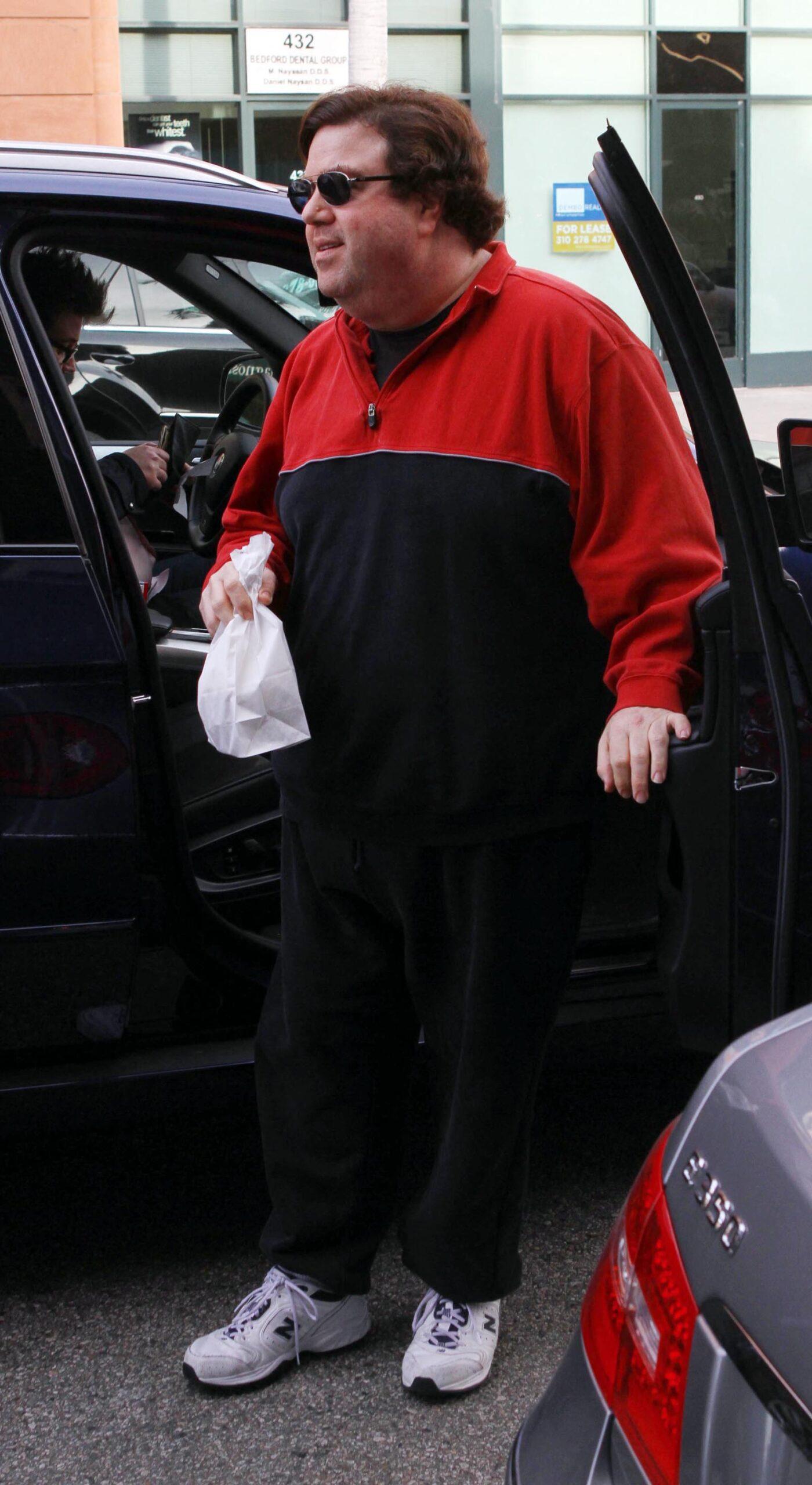 Dan Schneider getting out of the car