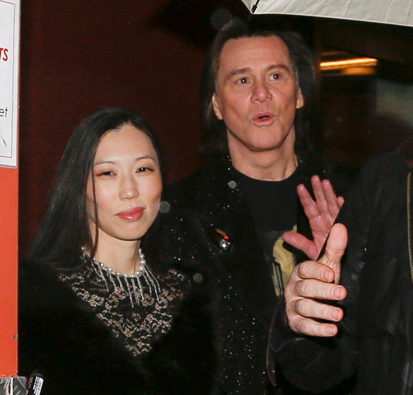 Jim Carrey is seen with his girlfriend Min Ah and his daughter leaving their hotel in Paris