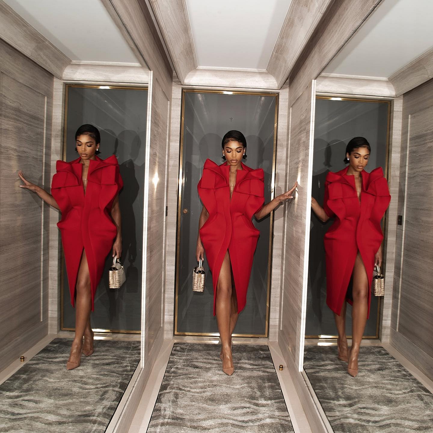 Lori Harvey wears draping red fabric in Paris