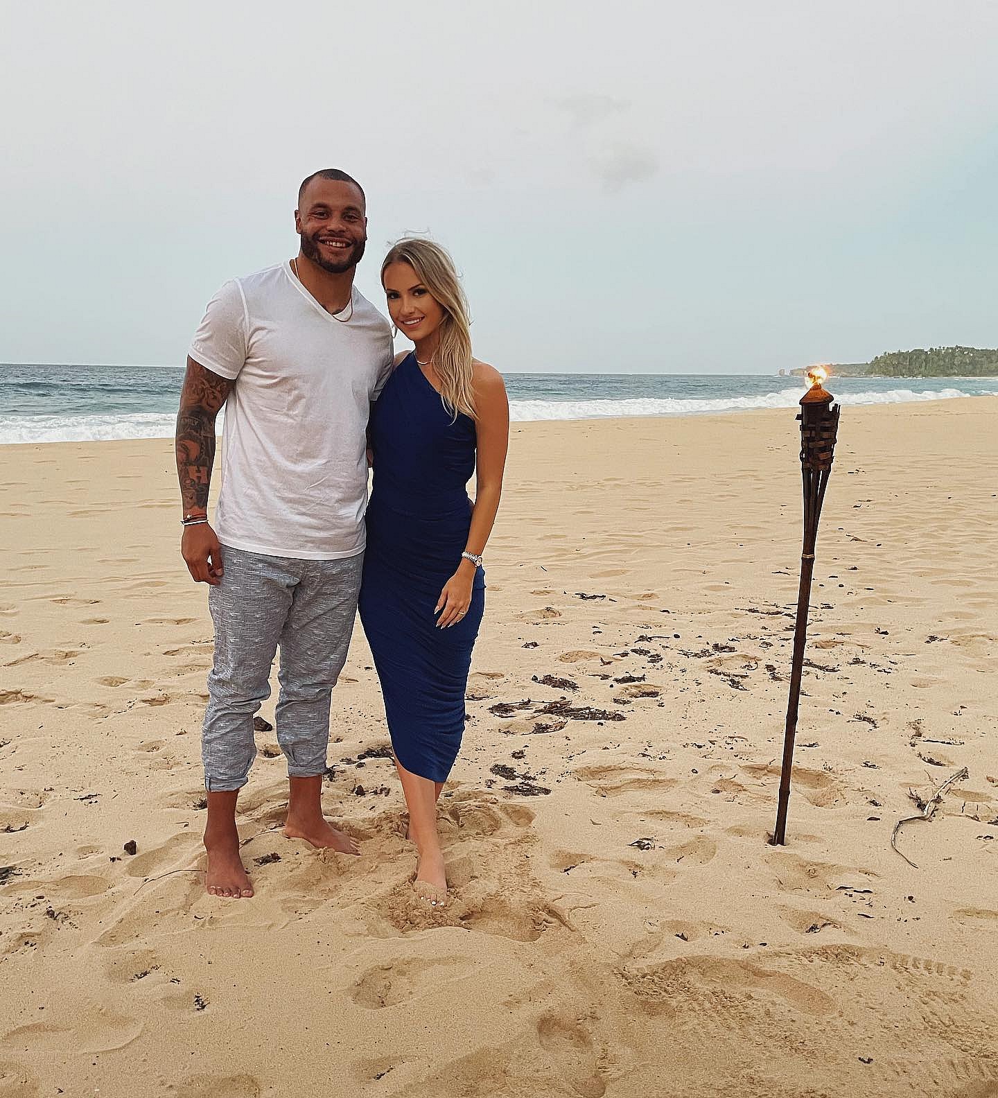 Dak Prescott poses next to Natalie Buffett