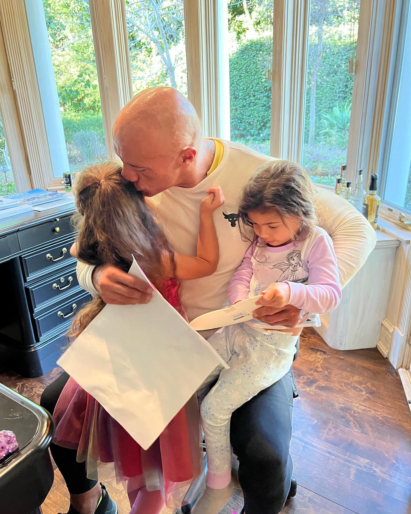 Dwayne Johnson and his two daughters, Tiana and Jasmine