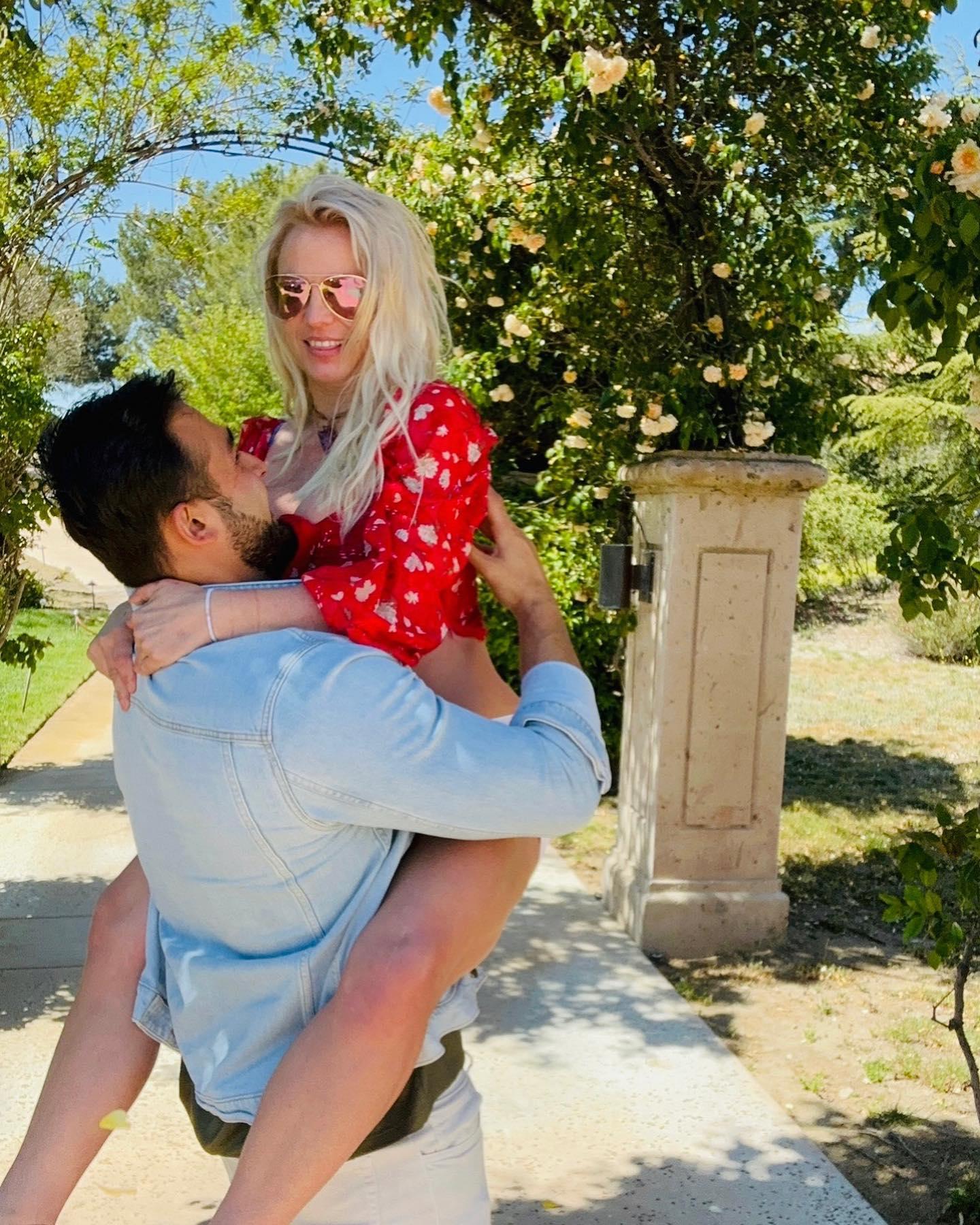 Britney Spears poses alongside Sam Asghari