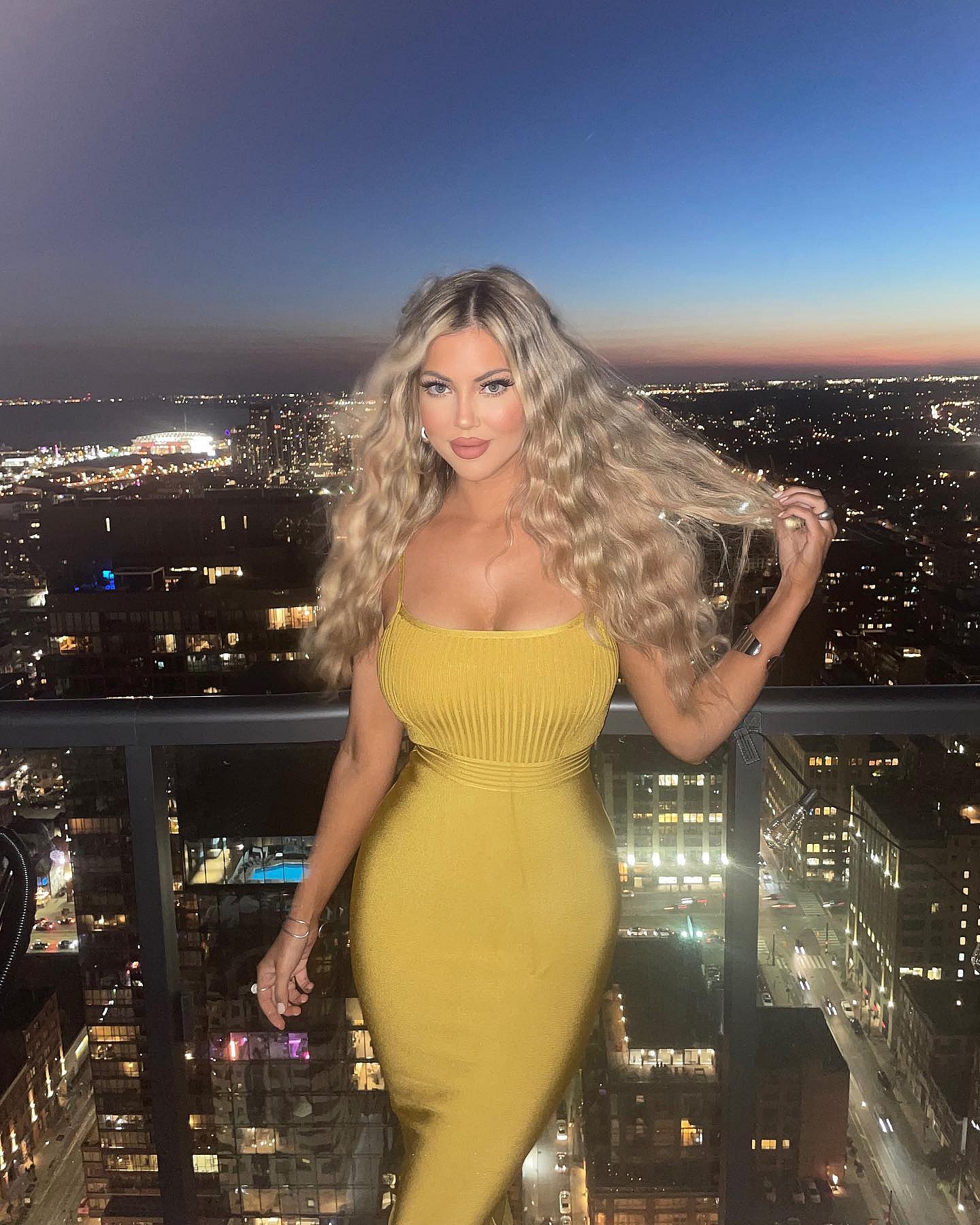 Sophia Pierson in a yellow dress