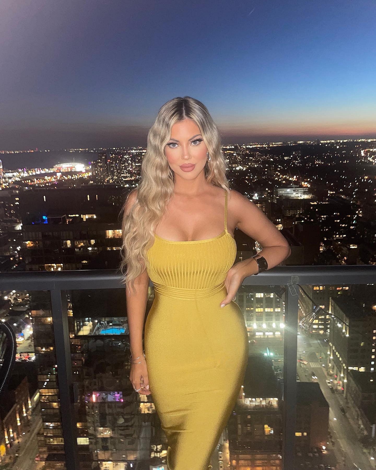 Sophia Pierson in a yellow dress 