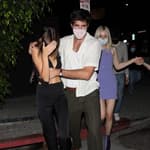 Kaia Gerber and Jacob Elordi are camera shy as the couple go club hopping