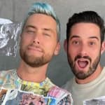 A photo showing Lance Bass and his husband, Michael Turchin, holding their kids' sonogram
