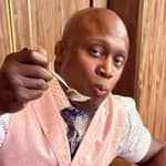 Bobby Lashley eating cake