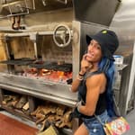 Sasha Banks near flaming grill