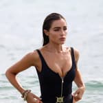 Olivia Culpo Flaunts New ‘Weapon Of Choice’ In Stunning Bond Girl Outfit