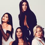 The Kardashian and Jenner women posing for the camera.