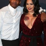 Stevie J & Faith Evans smiling