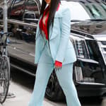 Cardi B looks looks radiant in a light blue suit as arriving at an office building in NYC