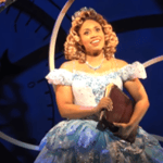 Brittney Johnson on stage as Glinda in Wicked