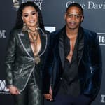 Faith Evans & Stevie J smiling