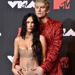 Megan Fox & Machine Gun Kelly Arrive To Party CHAINED Together By Their Fingernails!