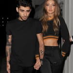 Zayn Malik and Gigi Hadid leaving the Versace Versus show