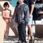Scott Disick looks relaxed as he spends time with his 3 children on the beach in Miami