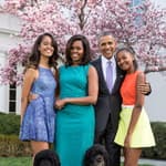 President Barack Obama, First Lady Michelle Obama, and daughters Malia and Sasha pose for a family portrait with Bo and Sunny in the Rose Garden of the White House on Easter Sunday, April 5, 2015.